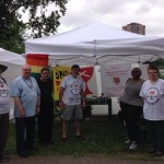 Members of Twin Cities area Open & Affirming Churches at their Pride Booth.